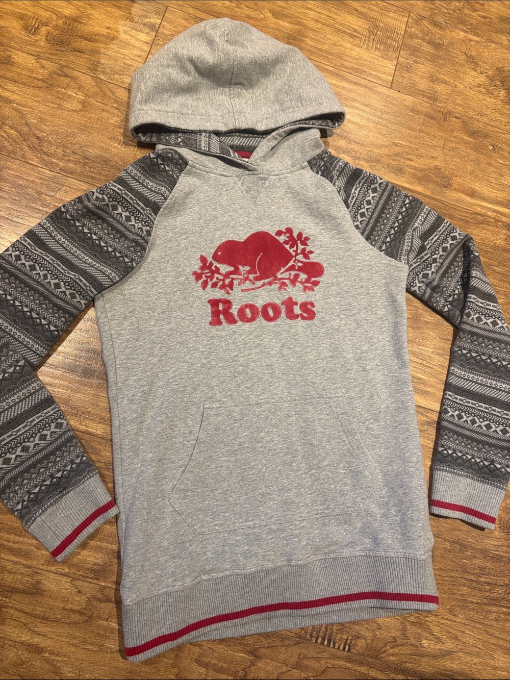 Roots Grey Hoodie with Patterned Black Sleeves and Red Logo